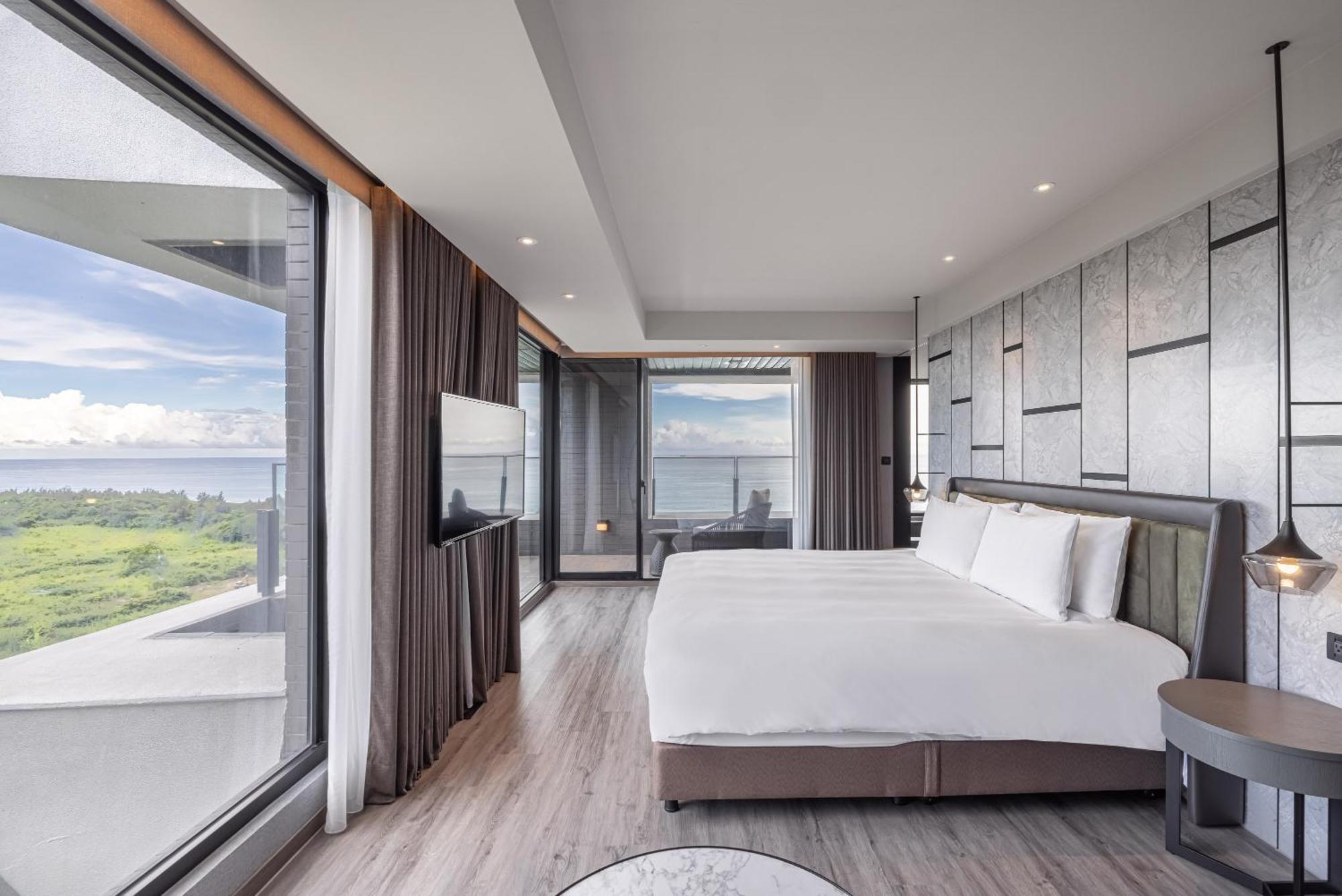 Lakeshore Hotel Hualien Taroko Shunan Szoba fotó A bedroom at the hotel
